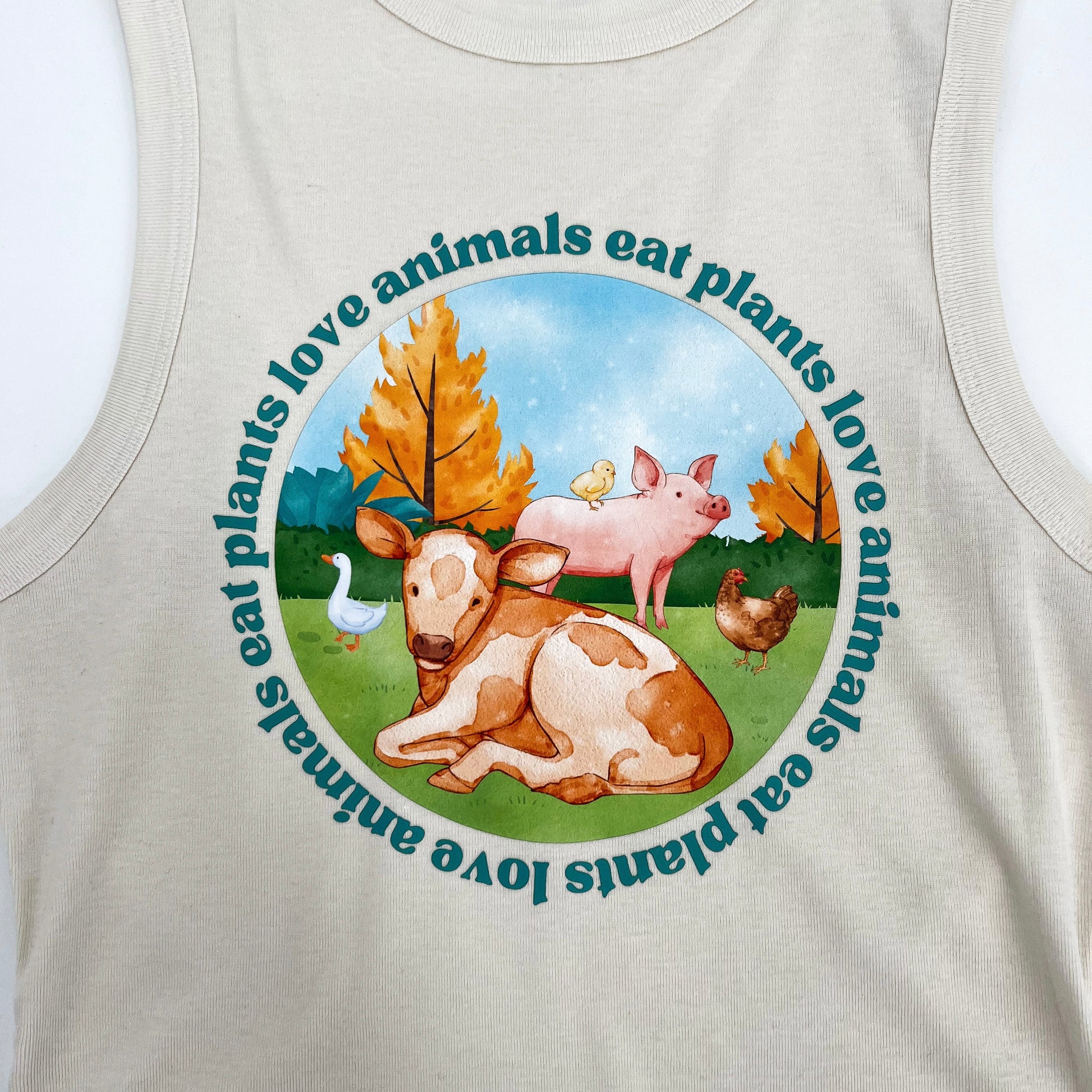 Natural colored cropped muscle tank featuring vegan activism graphic Love Animals Eat Plants