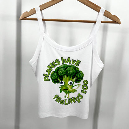 White cropped tank top featuring funny vegan activism graphic plants have feelings too