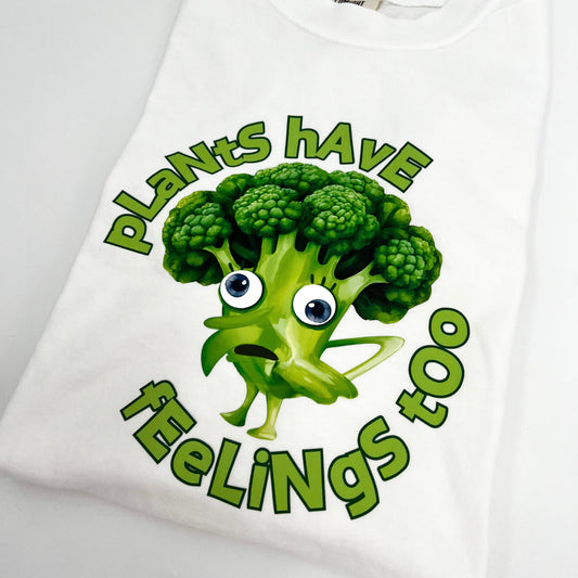 White vegan activism T-shirt featuring funny sarcastic Plants Have Feelings Too graphic