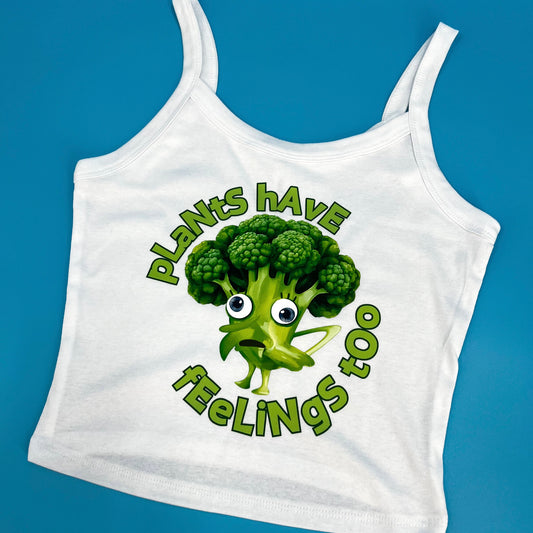 White cropped tank top featuring funny vegan activism graphic plants have feelings too