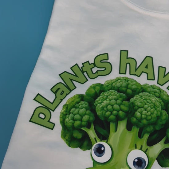 White vegan activism T-shirt featuring funny sarcastic Plants Have Feelings Too graphic