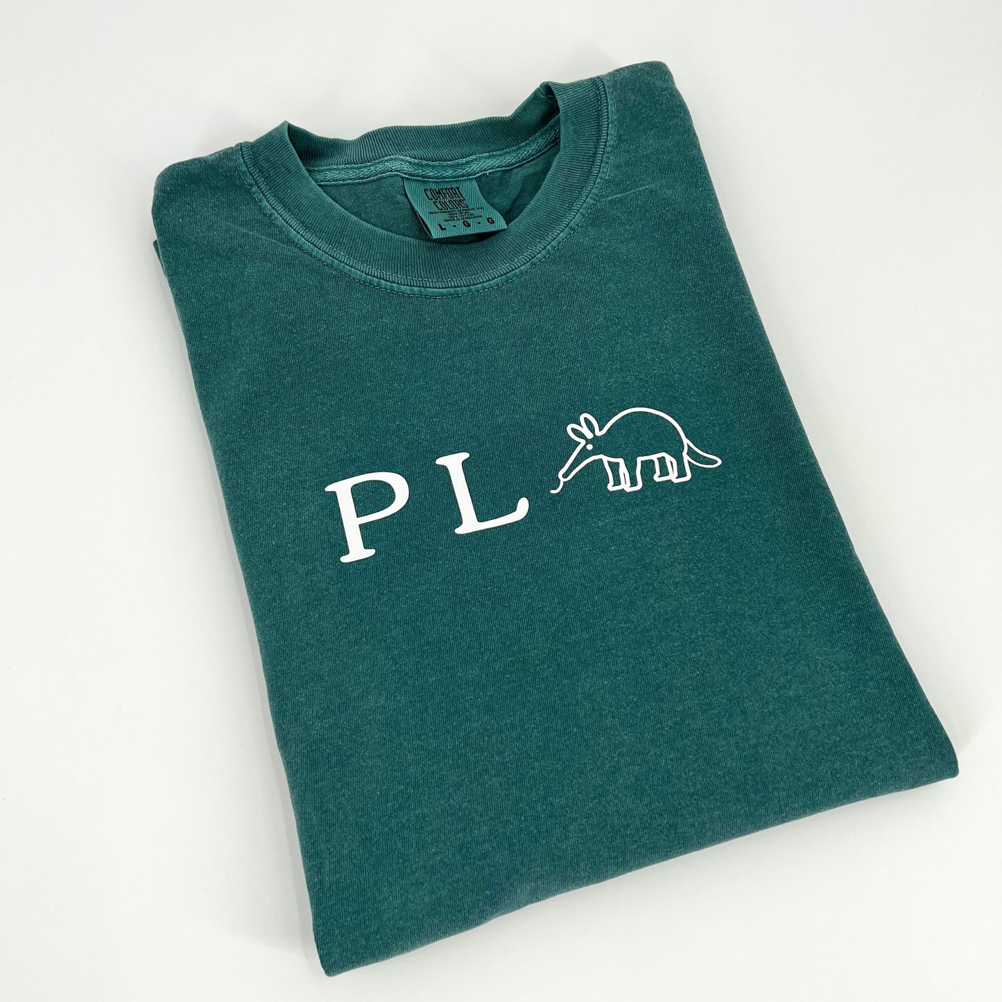 Blue vegan activism t-shirt featuring punny "P-L-Anteater" graphic