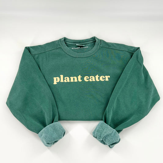 Plant Eater Vegan Activism Crewneck Sweatshirt in green with cream design