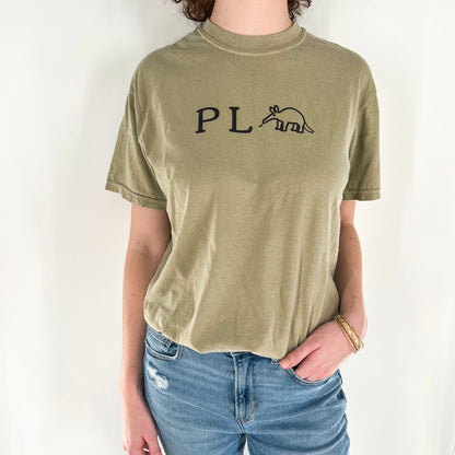 Punny P L Anteater vegan activism design in black on a khaki colored cotton shirt