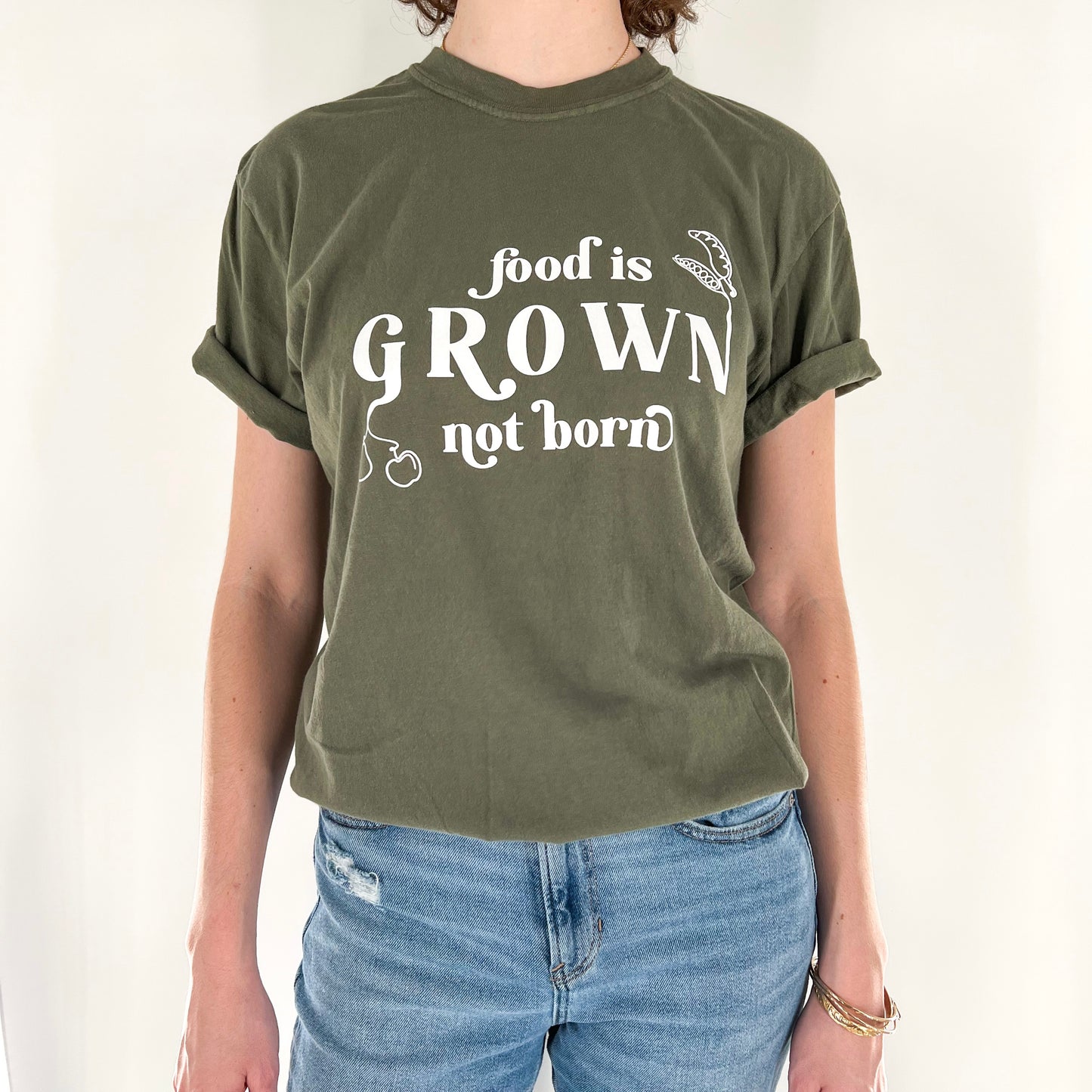 Model Wearing Food Is Grown Not Born Green Vegan Activism Shirt